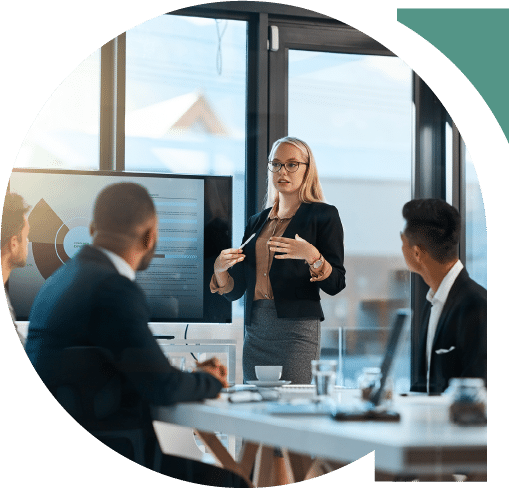 Young businesswoman giving a presentation to her colleagues in an office